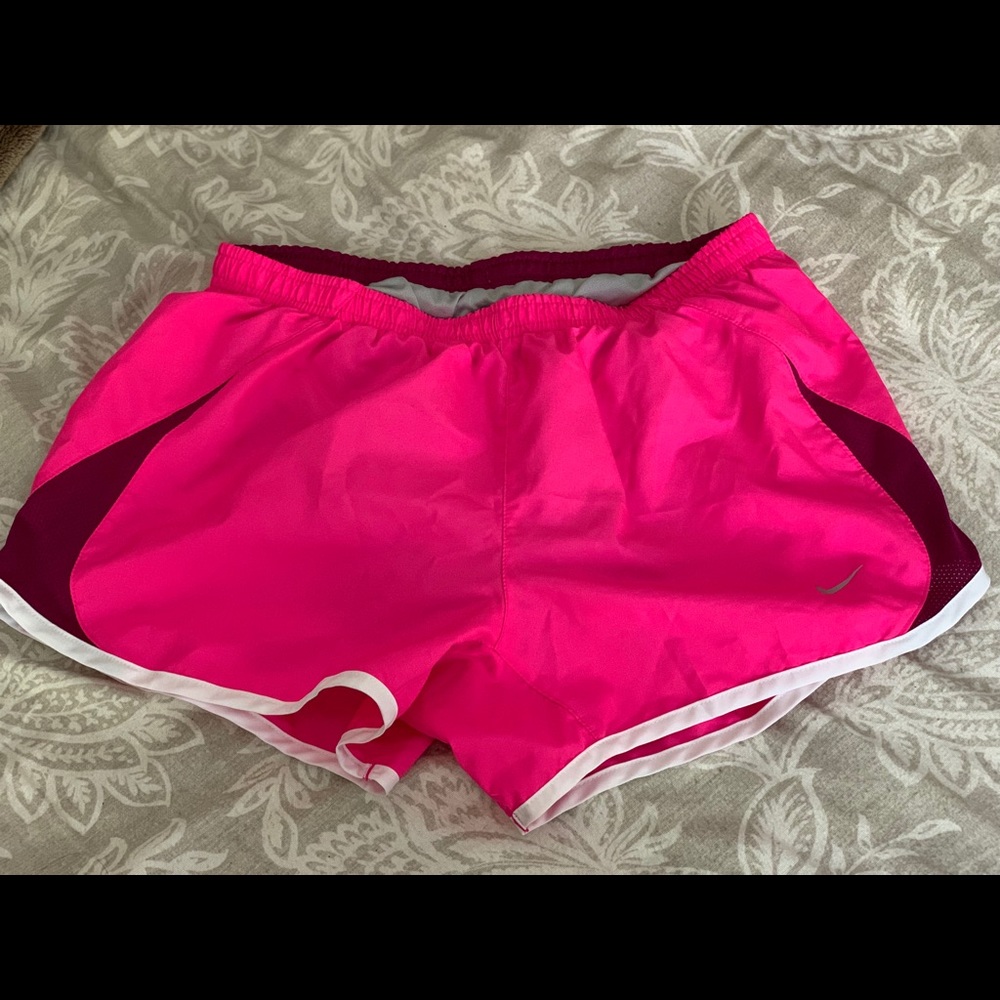 Pink nike running shorts
